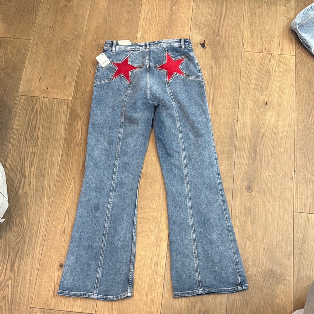 Free People Firecracker High Rise Flare Jeans with Red Stars